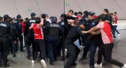 Aficionado de Chivas golpea a policía tras derrota contra América en el Estadio Akron (VIDEO)