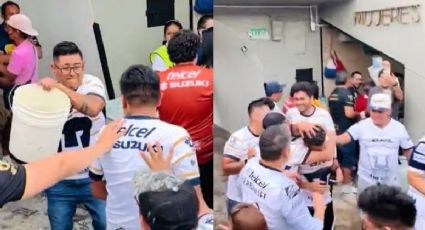 Aficionados de Pumas causan indignación y bautizan a aficionado en baños del Olímpico (VIDEO)